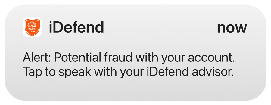 A mobile phone alert from iDefend that reads: "Alert: Potential fraud with your account. Tap to speak with your iDefend advisor."